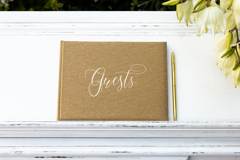 Guest book bound in kraft paper with golden inscription - 22 pages